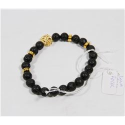 #21-BLACK VOLCANIC ROCK BRACELET LION HEAD BEAD