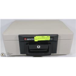 SENTRY SAFE WITH KEY. KEY ON TAG #95