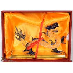 BLOWN GLASS DRAGON ORNAMENT.