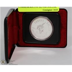 1875-1975 RCM CALGARY COMMEMORATIVE SILVER DOLLAR.