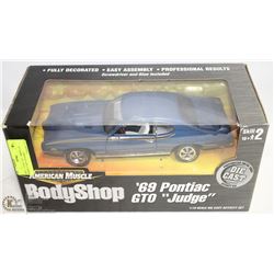 ERTL 1:18 DIE CAST AMERICAN MUSCLE 1969 GTO JUDGE.