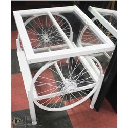 REPURPOSED WINDOW FRAME BIKE WHEEL PLANT TABLE.