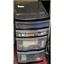 PLASTIC STORAGE ON WHEELS W/ SEWING SUPPLIES.