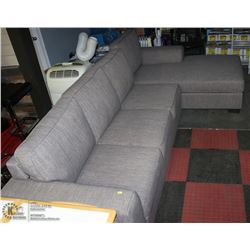 GREY FABRIC SECTIONAL NEEDS MINOR REPAIR
