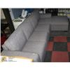 Image 1 : GREY FABRIC SECTIONAL NEEDS MINOR REPAIR