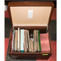 VINTAGE STORAGE STOOL WITH RECORDS.
