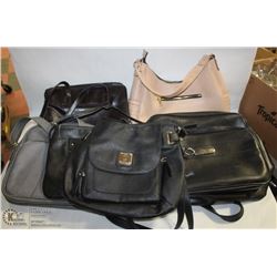 TOTE WITH PURSES AND TRAVEL BAGS.