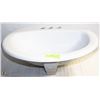 Image 1 : CERAMIC BATHROOM SINK 21X17.