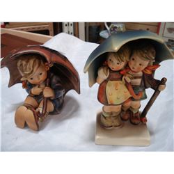 TWO HUMMEL FIGURES WITH UMBRELLA