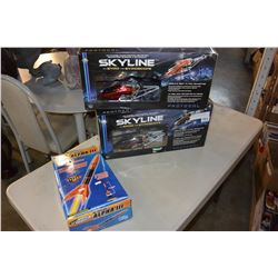 TWO SKYLINE RADIO CONTROLLED HELICOPTERS AND ROCKET MODEL