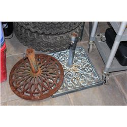 TWO METAL UMBRELLA STANDS