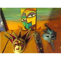 2 Masquerade masks and 2 mask wall hangings