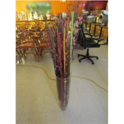 Clear glass vase with faux foliage and bamboo