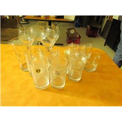 15 assorted glasses and wine glasses