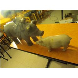 2 decorative pigs