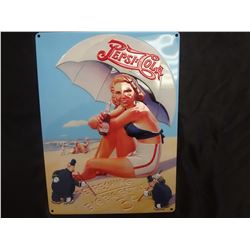 Pepsi beach lady tin sign