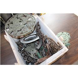 CRATE OF CAST IRON HORSE SHOES AND DECOR