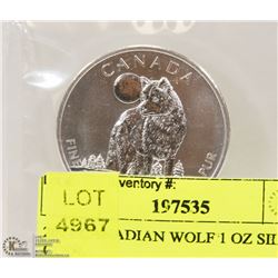 2011 CANADIAN WOLF 1 OZ SILVER COIN.