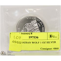 2011 CANADIAN WOLF 1 OZ SILVER COIN.