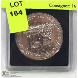 1885-1985 NATIONAL PARKS SILVER DOLLAR.