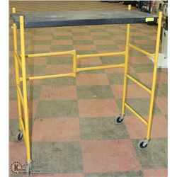 YELLOW METAL PORTABLE SCAFFOLDING