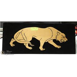 SABERTOOTH TIGER WOOD ON VELVET.