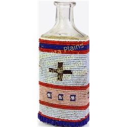 Early 20th century beaded buckskin medicine bottle