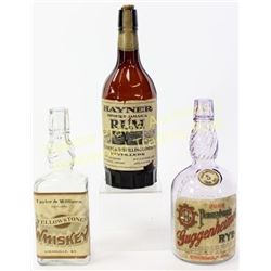 Collection of 3 antique liquor bottles