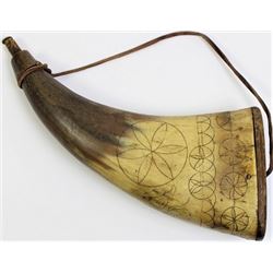 Early powder horn with incised carved artwork,