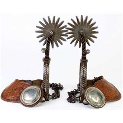 Large unmarked spurs with inlaid silver chevrons