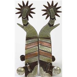 Single mounted Emerson stamped spurs