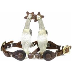 Double mounted split heel band spurs