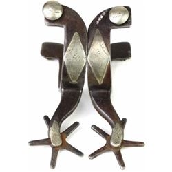 KB & P stamped double mounted spurs