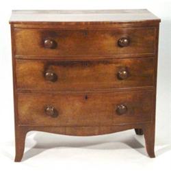 Victorian mahogany bow fronted chest of three drawers on splayed feet