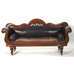 Victorian mahogany day bed with pierced and carved back and leatherette upholstery