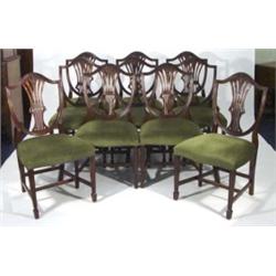 Set of ten good quality reproduction mahogany shield shaped dining chairs with wheatsheaf backs, uph