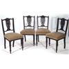 Image 1 : Set of four Victorian ebonized dining chairs with carved fleur de lys floral backs on turned legs wi