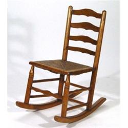 Victorian oak rush seated rocking chair