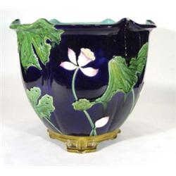 Large Minton Majolica jardiniere, relief moulded and hand painted with leaves and flowers onto a cob
