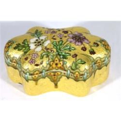 Sevres Majolica pottery trinket box and cover, hand painted and tubelined with flowers onto a gilt g