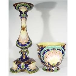 Continental Majolica jardiniere on stand, relief moulded with shells amongst swags, decorated in blu