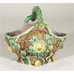 Victorian Majolica basket, relief moulded and painted with green leaves onto a brown ground with pin