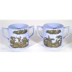 Two Victorian Prattware tankards, printed with hunters on horseback onto a blue ground, lozenge mark
