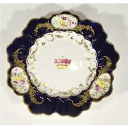 19th century pottery plate, hand painted with panels of flowers onto a cobalt blue ground, 24cm diam
