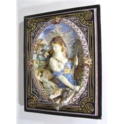 Pair of rectangular Continental pottery wall plaques, one relief moulded and hand painted with Diana