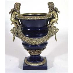 Cobalt blue glazed Continental porcelain campana shaped urn with brass ormolu mounts, winged cherubs