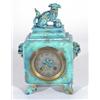 Image 1 : Turquoise glazed Continental chiming pottery mantel clock, modelled with dogs of Foo with enamel dia