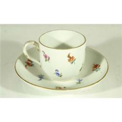 19th century Meissen porcelain cup and saucer, hand painted with sprigs of flowers, blue underglazed