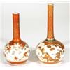 Image 1 : Two Japanese Kutani bottle vases, decorated with flowers and trees, marks to bases, largest 20cm hig