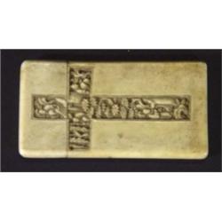 Rectangular ivory card case, carved with a cross shaped panel of figures, 9cm high